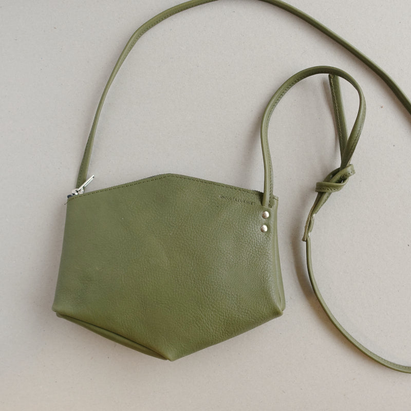A small olive green geometric shaped eco leather shoulder bag, 